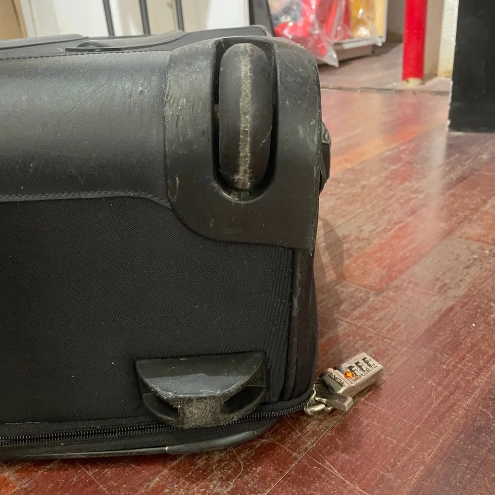Tumi Black Rolling Suitcase